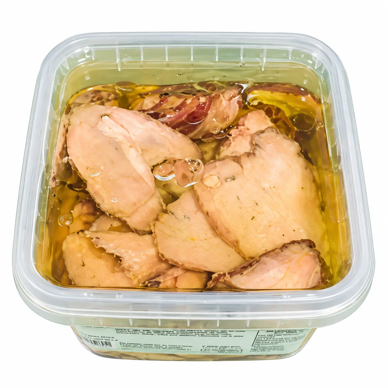 Tarrina transparente de carne en aceite